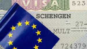 An image of an EU flag on a Schengen visa